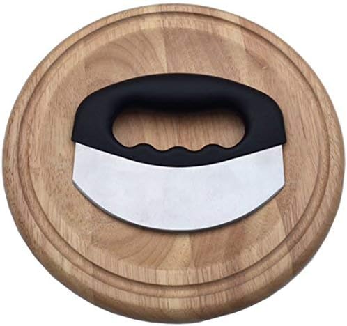 Single curved mezzaluna blade with a central handle on a round cutting board